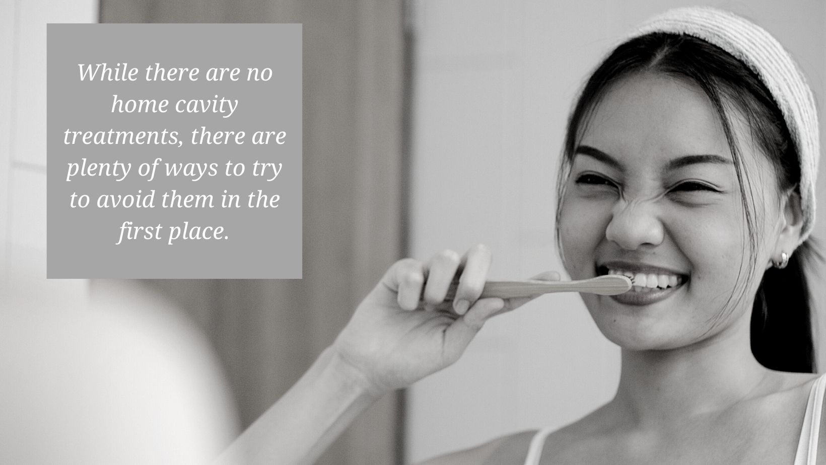 person brushing teeth to avoid cavities