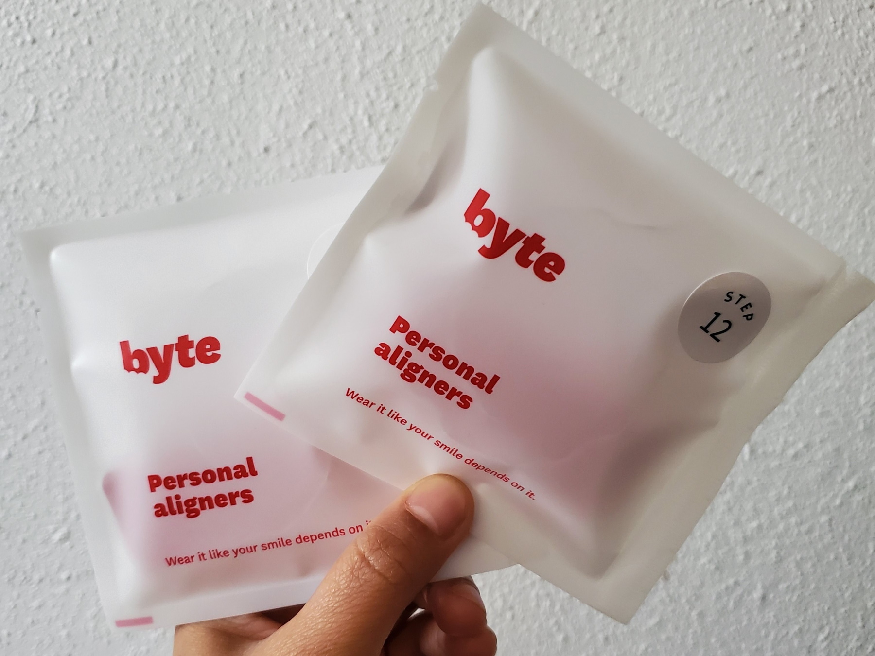 Invisalign vs. byte personal aligners that come in the mail