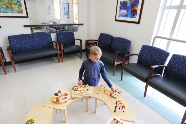 children at the dentist waiting room